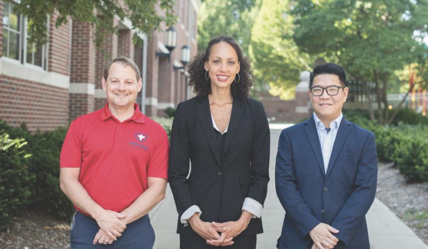 Karen Tabb with collaborators standing outside on U of I campus