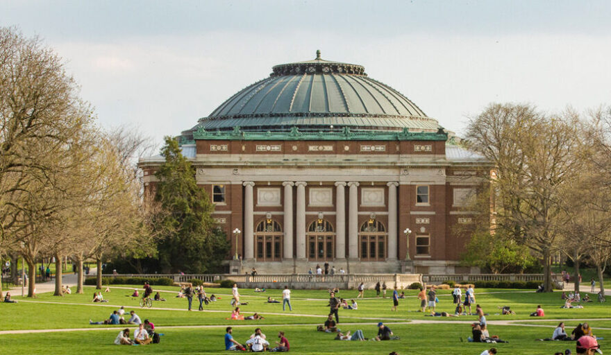 Early spring view of the Quad with students enjoying the weather.