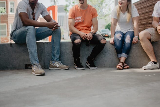 photo of group of people talking