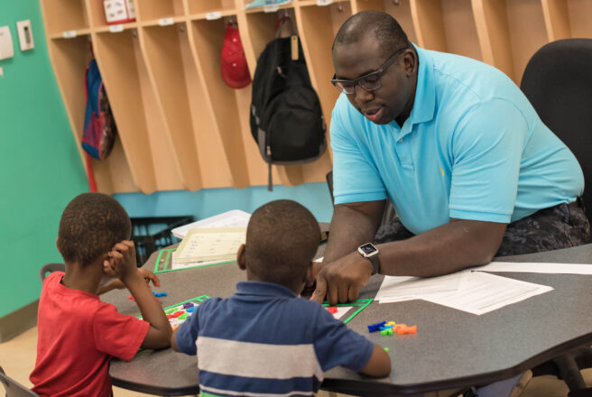 young children learning from instructor