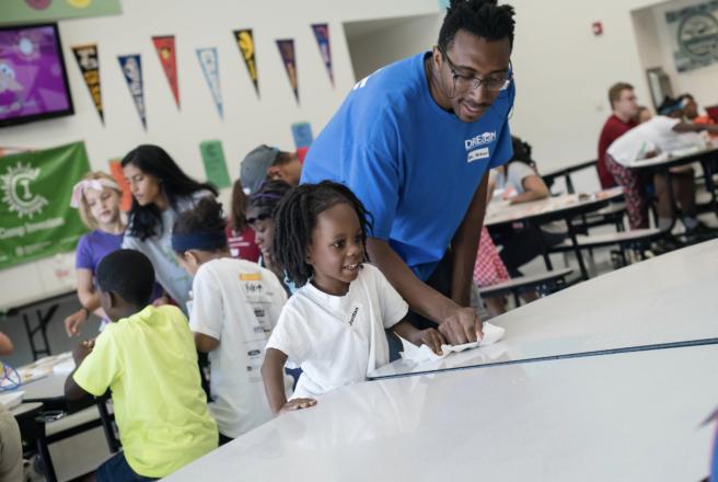 image of student with child