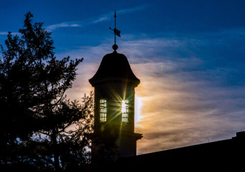 image of top of illini union at sunrise