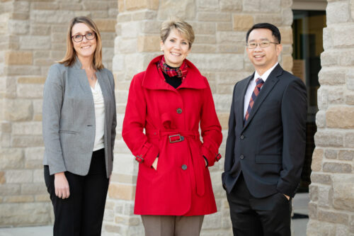 Shown with Professor Kevin Tan are, from left: director of instruction Nicole Rummel and superintendent Lindsey Hall, both of Mahomet-Seymour CUSD No. 3.