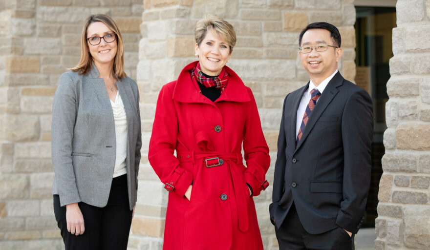 Shown with Professor Kevin Tan are, from left: director of instruction Nicole Rummel and superintendent Lindsey Hall, both of Mahomet-Seymour CUSD No. 3.