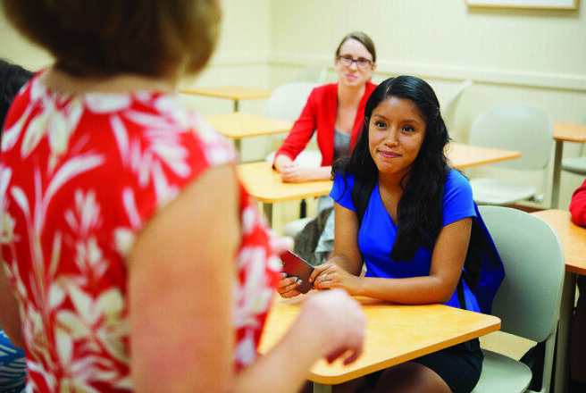 Students listening to instructor