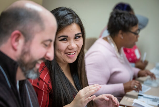 image of student talking to another