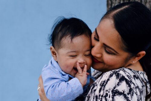 mother holding child