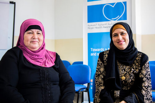 image of mother/daughter seated together in patient program