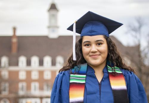 graduate in cap and gown