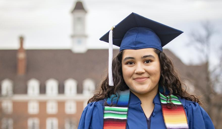 graduate in cap and gown