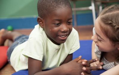 image of two children playing together