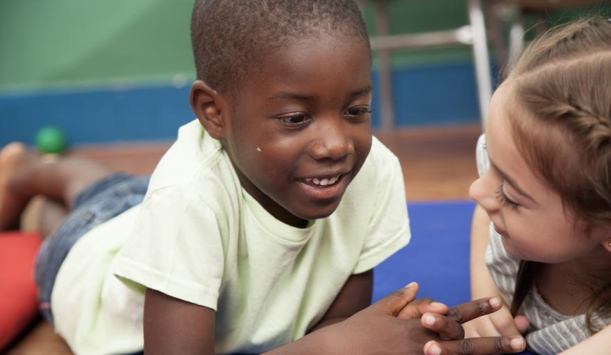 image of two children playing together