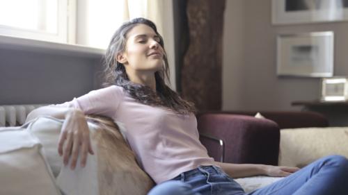 Photo of woman relaxing on the couch