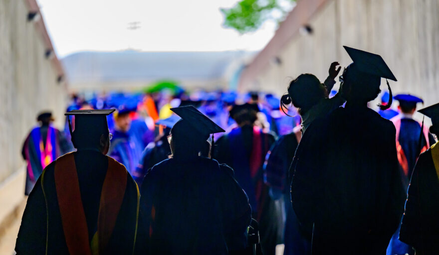 image of graduates in shadows